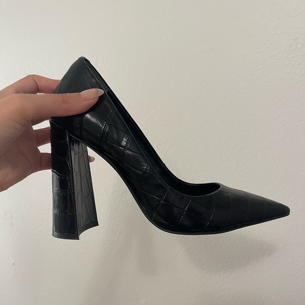 Black pointed toe heels